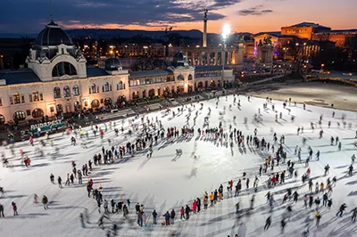 view of the ice rink in City park from above around the golden hour in winter