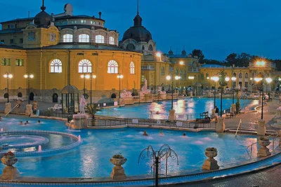 the outdoor pools of Széchenyi Bath at the blue hour in winter