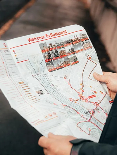 Someone holding a Budapest Tourist Map in their hands
