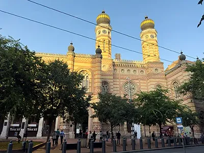 front view of the twin-tower Dohany Street Synagogue at the golden hour on n autumn day 
