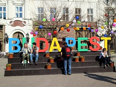 The word "Budapest" made out of colourful letter installations in front of Gerbeaud Cafe during the Easter Fair