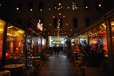 restaurants and bars illuminated at night in Gozsdu Court