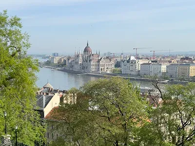view from the terrace of Buda Castle in April: the Parliament can be seen in Pest